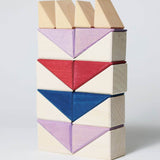 Simple tower stack using different handcrafted wooden Grimms pieces from the rhythm set 