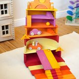 A archway stack structure made from Grimms wooden pastel building boards and other building blocks in the Babipur playroom