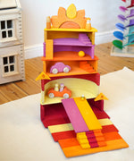 A archway stack structure made from Grimms wooden pastel building boards and other building blocks in the Babipur playroom