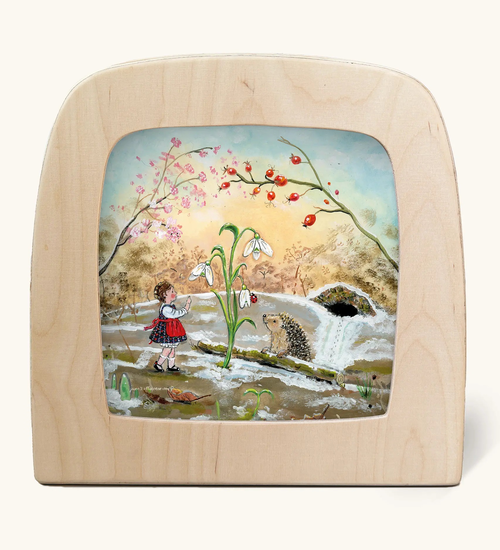 Toverlux silhouette of a winter scene, a hedgehog coming out of hibernation with a snowdrop and young girl for January, February and March celebrations.