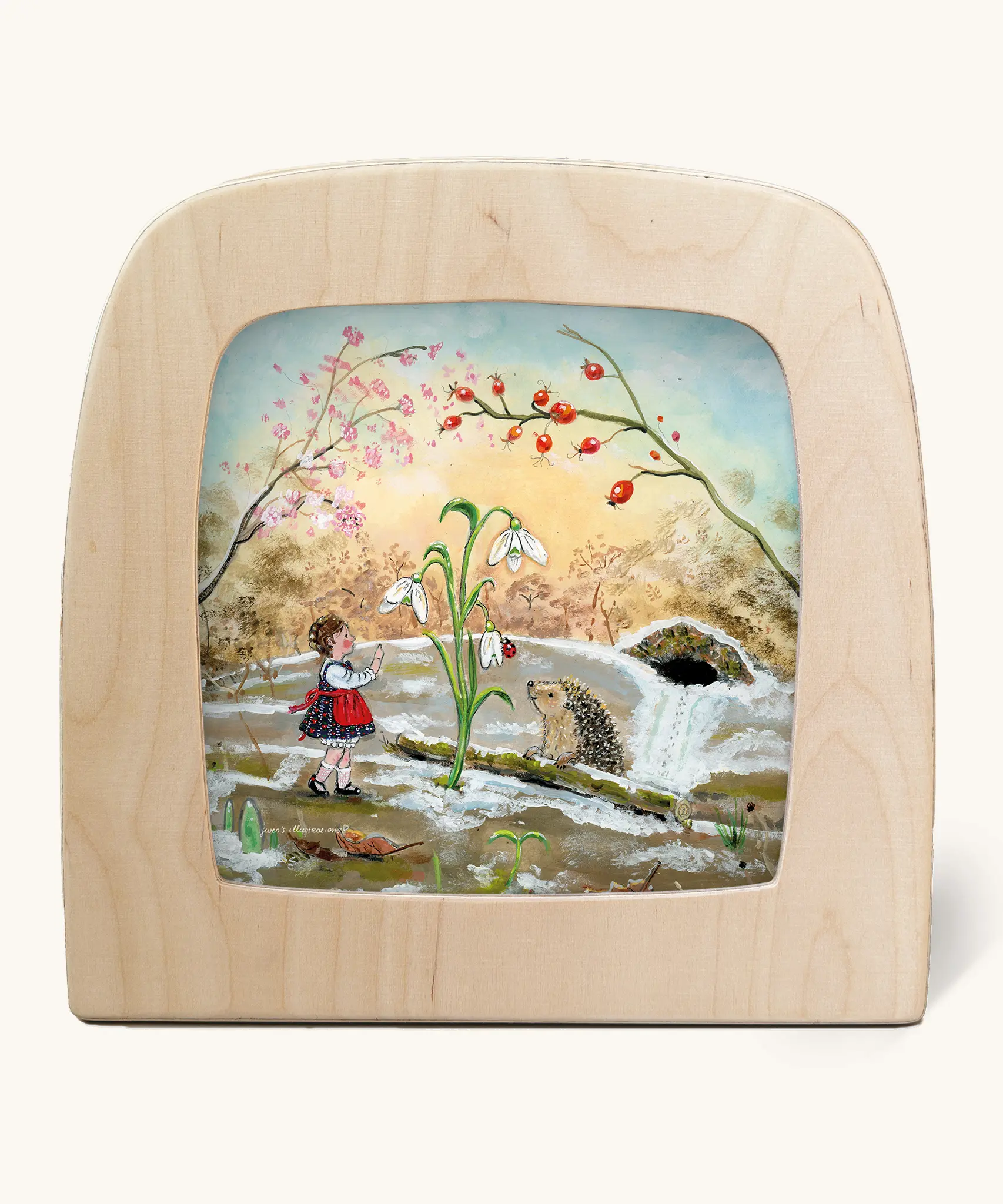 Toverlux silhouette of a winter scene, a hedgehog coming out of hibernation with a snowdrop and young girl for January, February and March celebrations.
