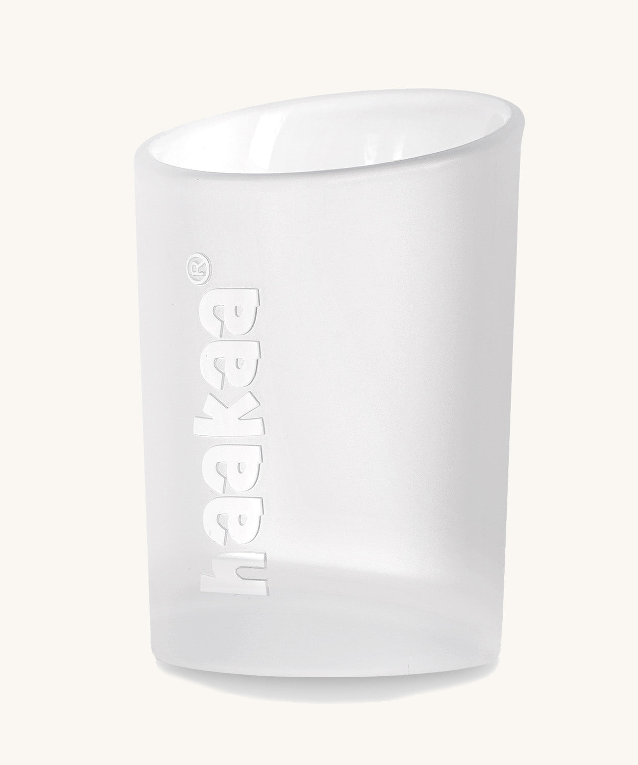 The collecting cup from the Haakaa colostrum collector feeding pack.