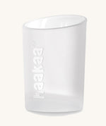 The collecting cup from the Haakaa colostrum collector feeding pack.