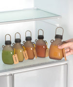 The Haakaa Happii Bear Silicone Goody Pouches in a fridge. The food pouches are suitable for the fridge to keep food fresh