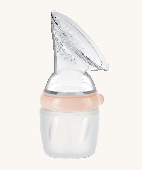 Generation 3 160ml Silicone Breast Pump in peach on a cream background