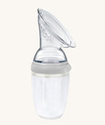 The Generation 3 250ml Silicone Breast Pump in grey on a cream background