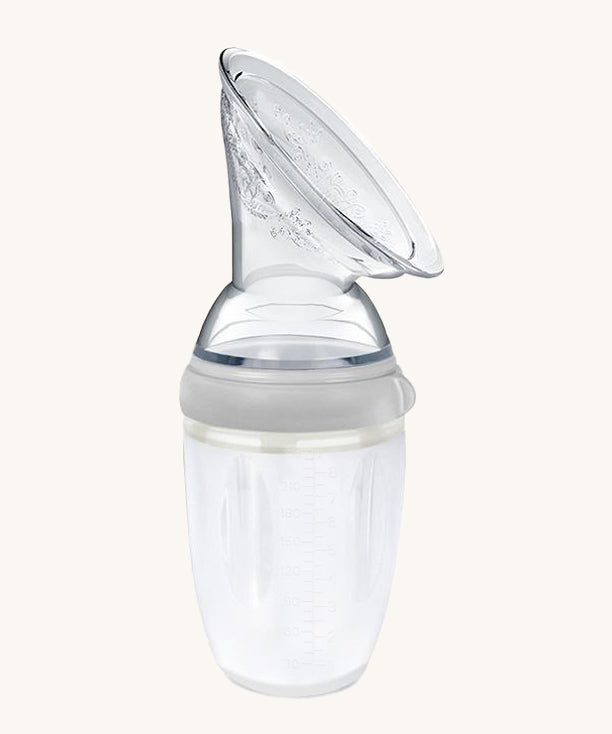 The Generation 3 250ml Silicone Breast Pump in grey on a cream background
