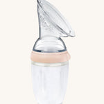 Generation 3 250ml Silicone Breast Pump in peach on a cream background