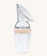 Generation 3 250ml Silicone Breast Pump in peach on a cream background