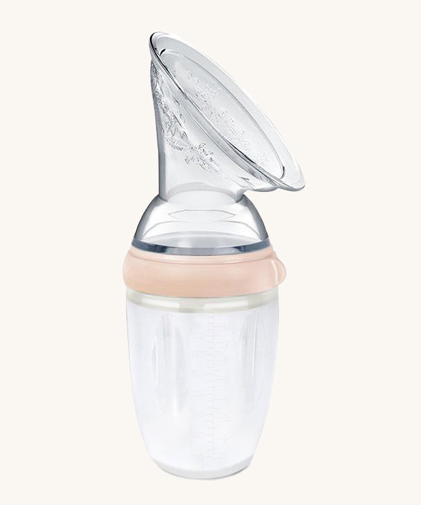 Generation 3 250ml Silicone Breast Pump in peach on a cream background