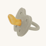 Hevea Orthodontic Baby Pacifier - 0-3 Months in Oatmeal on a cream background