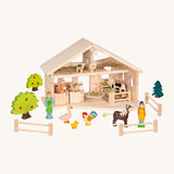 Holztiger wooden stable setup with different hand crafted wooden farm animals. and people figures 