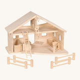 Holztiger wooden stable set made from natural unfinished wood includes a crane, ladder, fences and animal pens