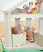 Holztiger Wooden Stable Toy With working Rope Winch and opening horse stable doors.