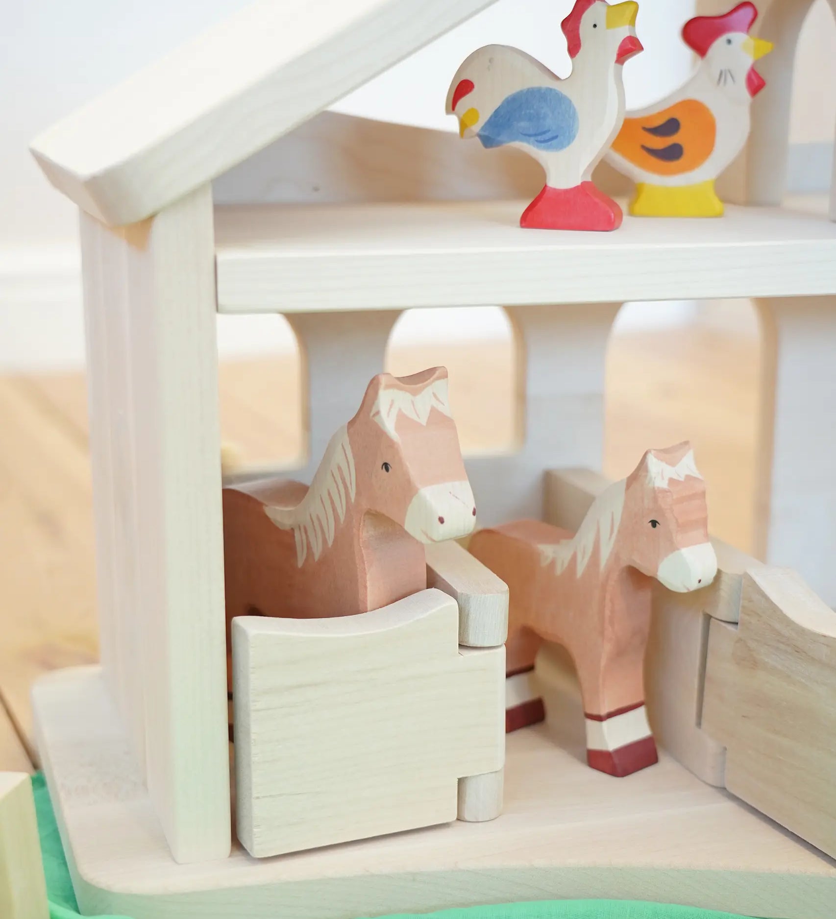 Holztiger Wooden Stable Toy With working Rope Winch and opening horse stable doors.