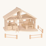 Holztiger wooden stable set made from natural unfinished wood. Set includes a crane, ladder, fences and animal pens