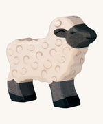 Holztiger white wooden standing lamb  figure with black feet, face and 