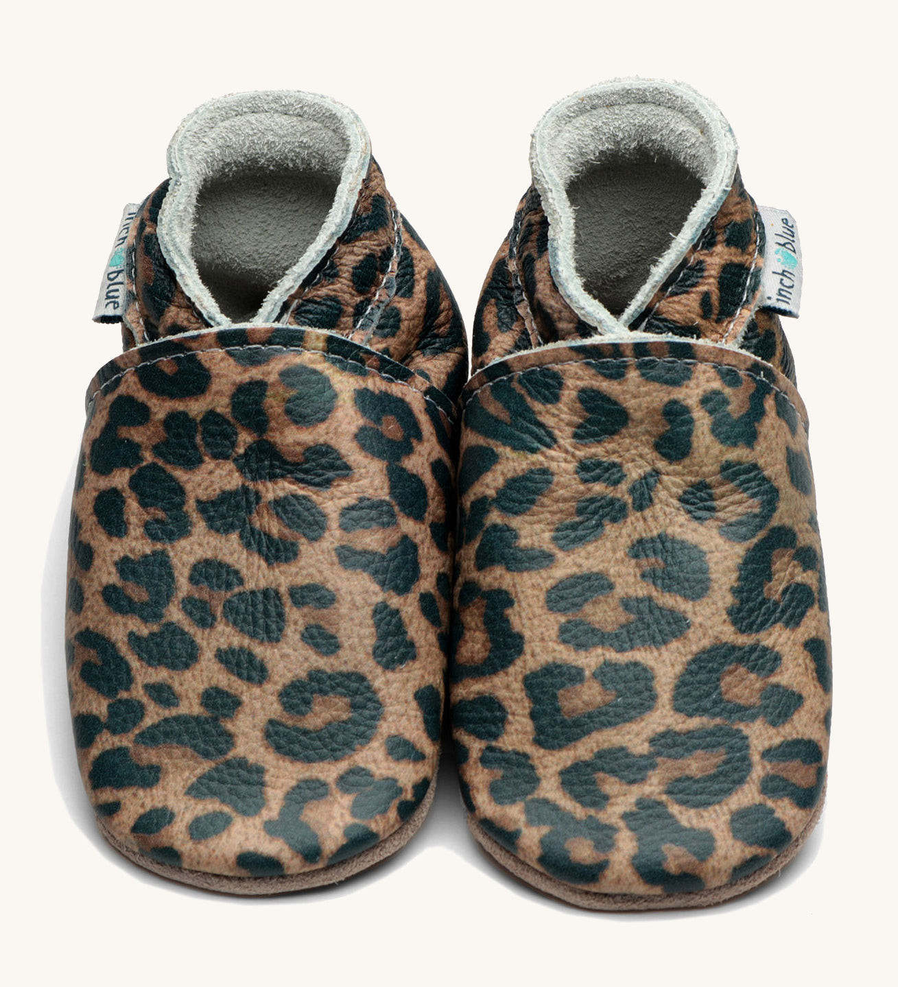 Inch Blue leopard baby shoes available at Babipur. A soft leather baby shoe with an all over leopard design on each shoe. Features elastic ankle cuffs for a secured fit