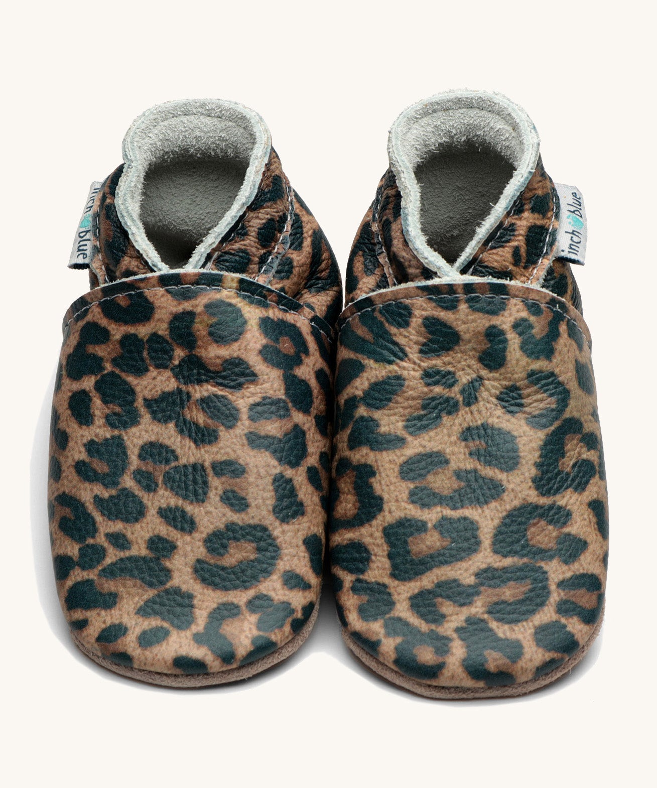 Inch Blue leopard baby shoes available at Babipur. A soft leather baby shoe with an all over leopard design on each shoe. Features elastic ankle cuffs for a secured fit
