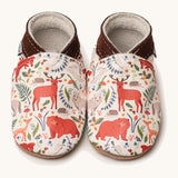 Inch Blue stag & friends shoes available at Babipur. A soft white baby leather shoe with cute pastel coloured stag and woodland animals on each shoe. Features elastic ankle cuffs for a secured fit