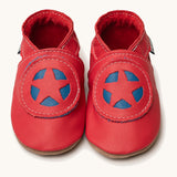 Inch Blue superkid red baby shoes available at Babipur. A soft red baby leather shoe with a red and blue star shield design on each shoe. Features elastic ankle cuffs for a secured fit