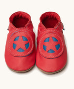 Inch Blue superkid red baby shoes available at Babipur. A soft red baby leather shoe with a red and blue star shield design on each shoe. Features elastic ankle cuffs for a secured fit