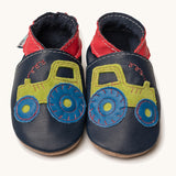 Inch Blue navy tractor baby shoes available at Babipur. A soft navy baby leather shoe with a playful green suede tractor and red collar on each shoe. Features elastic ankle cuffs for a secured fit