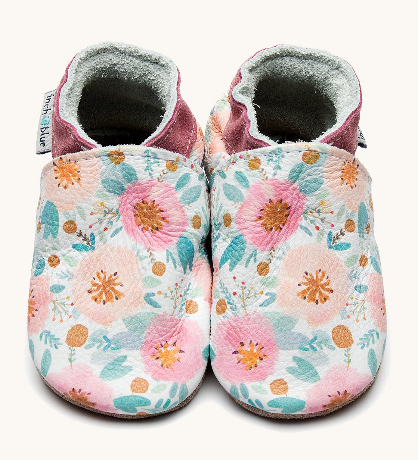 Inch Blue wildroses shoes available at Babipur. A soft white baby leather shoe with a cute pastel coloured floral design on each shoe. Features elastic ankle cuffs for a secured fit