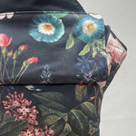 Integra Baby Carrier - Vintage Summer. Vintage Summer is a beautiful Victorian botanical floral print in soft organic cotton featuring hydrangeas, lilac and roses on a black background.