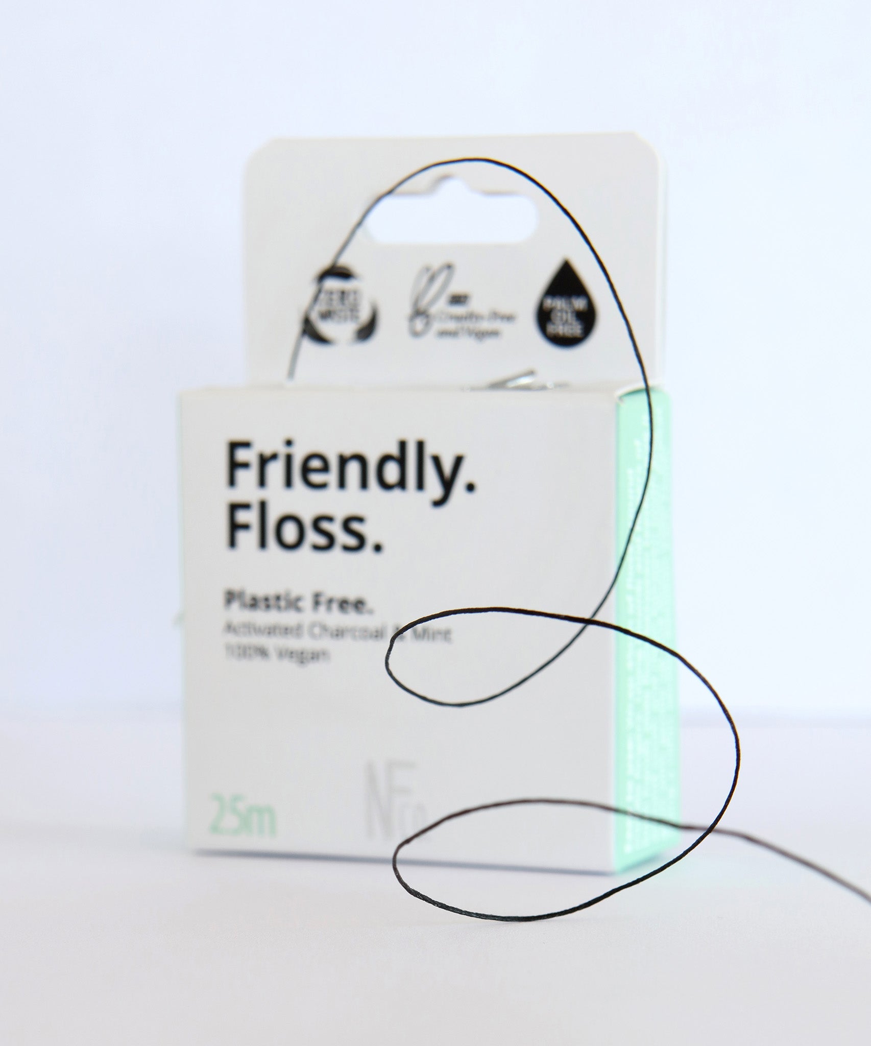 A close up of the Jack N Jill friendly dental floss available at Babipur. Showing the floss out of the box 