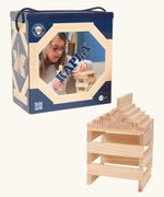 A box of 120 Kapla natural wooden construction planks. A stack can be seen next to the box 