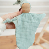 Käthe Kruse comforter Waldorf doll, turquoise imp made from cotton muslin.