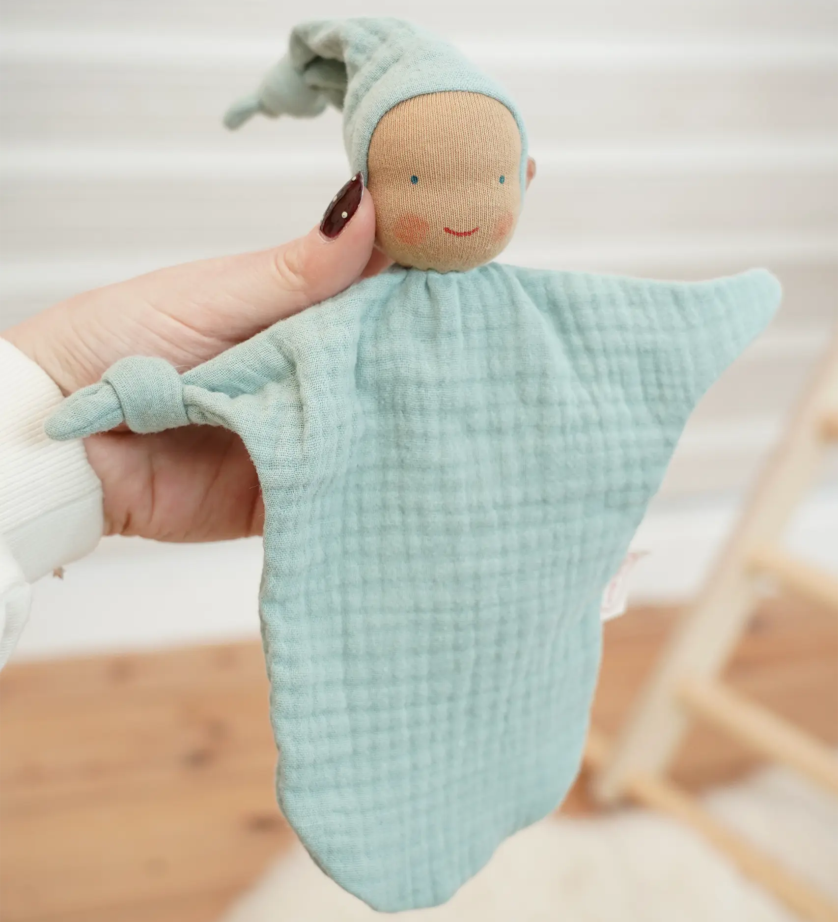 Käthe Kruse comforter Waldorf doll, turquoise imp made from cotton muslin.