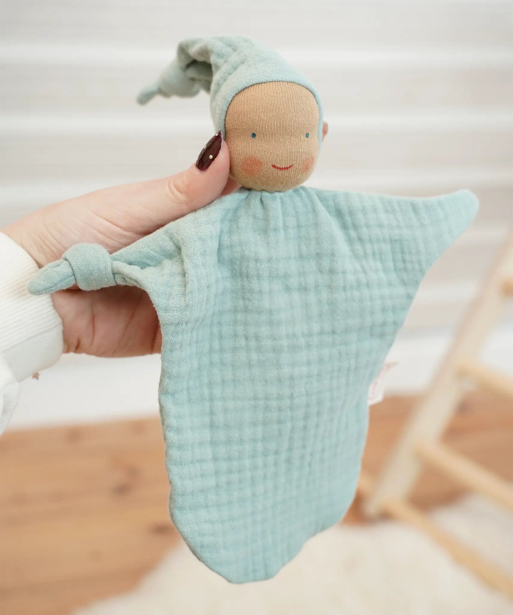 Käthe Kruse comforter Waldorf doll, turquoise imp made from cotton muslin.