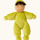 Kathe Kruse Lolo moss waldorf doll showing a light green towelling outfit, light skin and dark hair.