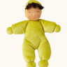 Kathe Kruse Lolo moss waldorf doll showing a light green towelling outfit, light skin and dark hair.