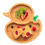 Eco Rascals Duck Bamboo Suction Plate, with fresh fruit and raspberry loaf.