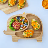 Elephant bamboo baby weaning plate with veg and cheese stuffet jacket potatoes and a fruit salad side. .