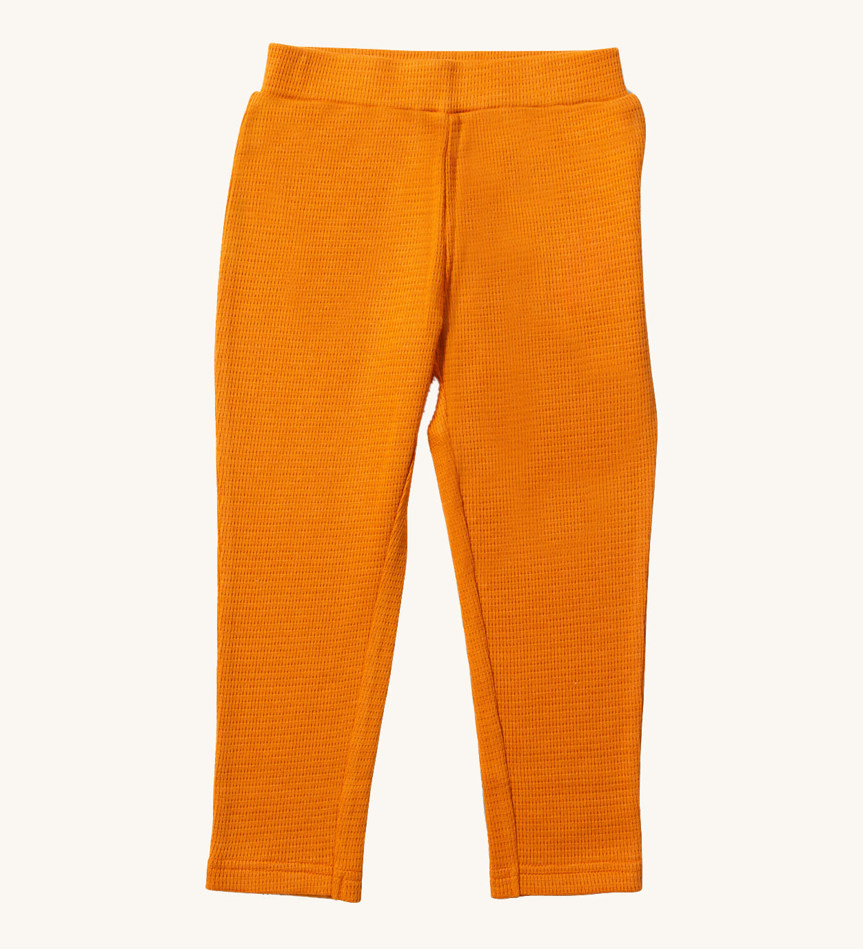 Little Green Radicals Waffle Leggings - Golden Ochre available at Babipur. A yellow GOTS organic cotton leggings with an elasticated waistband and waffle texture fabric