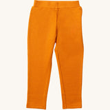 Little Green Radicals Waffle Leggings - Golden Ochre available at Babipur. A yellow GOTS organic cotton leggings with an elasticated waistband and waffle texture fabric