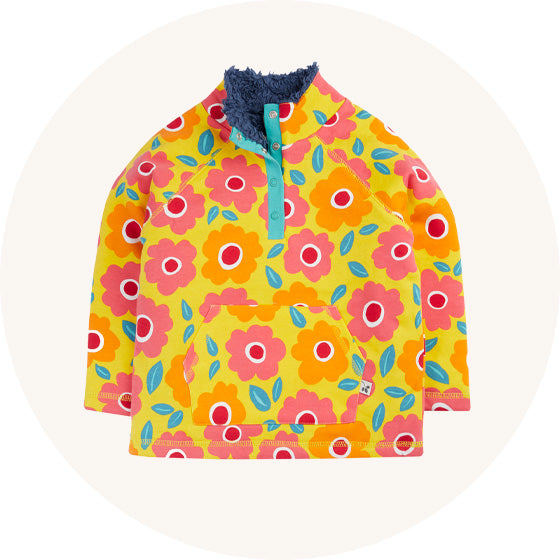 Frugi Snuggle organic cotton Fleece with yellow and pink floral print, to represent kids jumpers, cardigans and sweatshirts at Babipur.