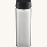 Klean Kanteen 27oz Wide Bottle with loop cap, on a cream background