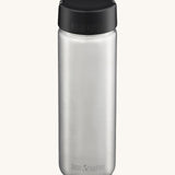 Klean Kanteen 27oz Wide Bottle with loop cap, on a cream background