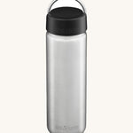 Klean Kanteen 27oz Wide Bottle with loop cap, on a cream background