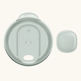 A small 78mm Klean Kanteen splash proof rise slide lid in dawn blue with the slider removed from the lid for easy cleaning
