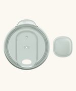 A small 78mm Klean Kanteen splash proof rise slide lid in dawn blue with the slider removed from the lid for easy cleaning