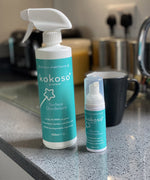 Kokoso protect foaming hand sanitiser original 50ml bottle standing next to the Kokoso surface disinfectant bottle. Both available at Babipur