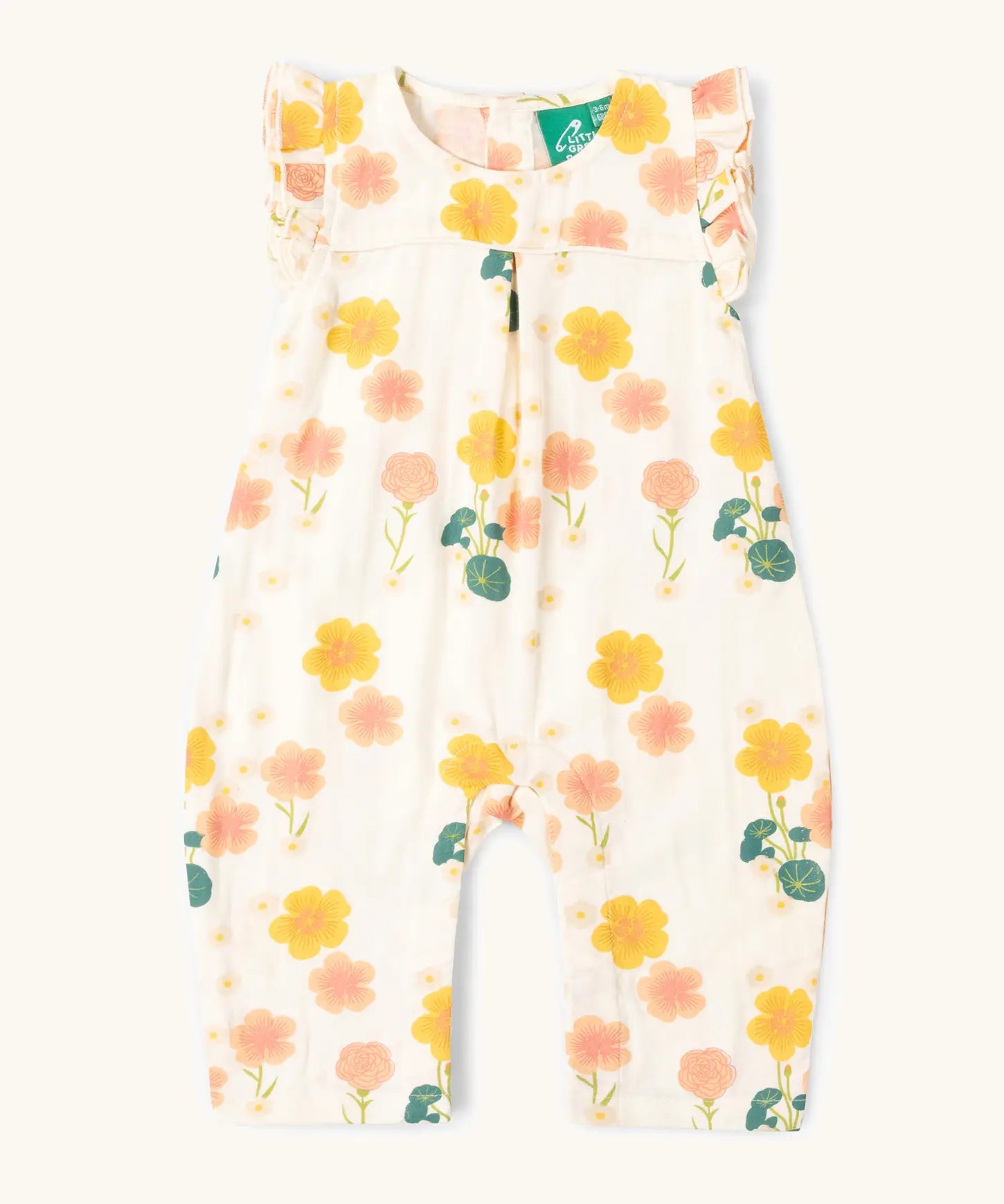 Little Green Radicals kids flora frill summer romper dress in cream with a repeating floral design.  