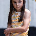 A child wearing the yellow stripe vest top, from the LGR Adventure Organic Vest Set - 3 Pack