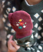 A closer look at the flower embroidered detail on the Hazelnut mittens
